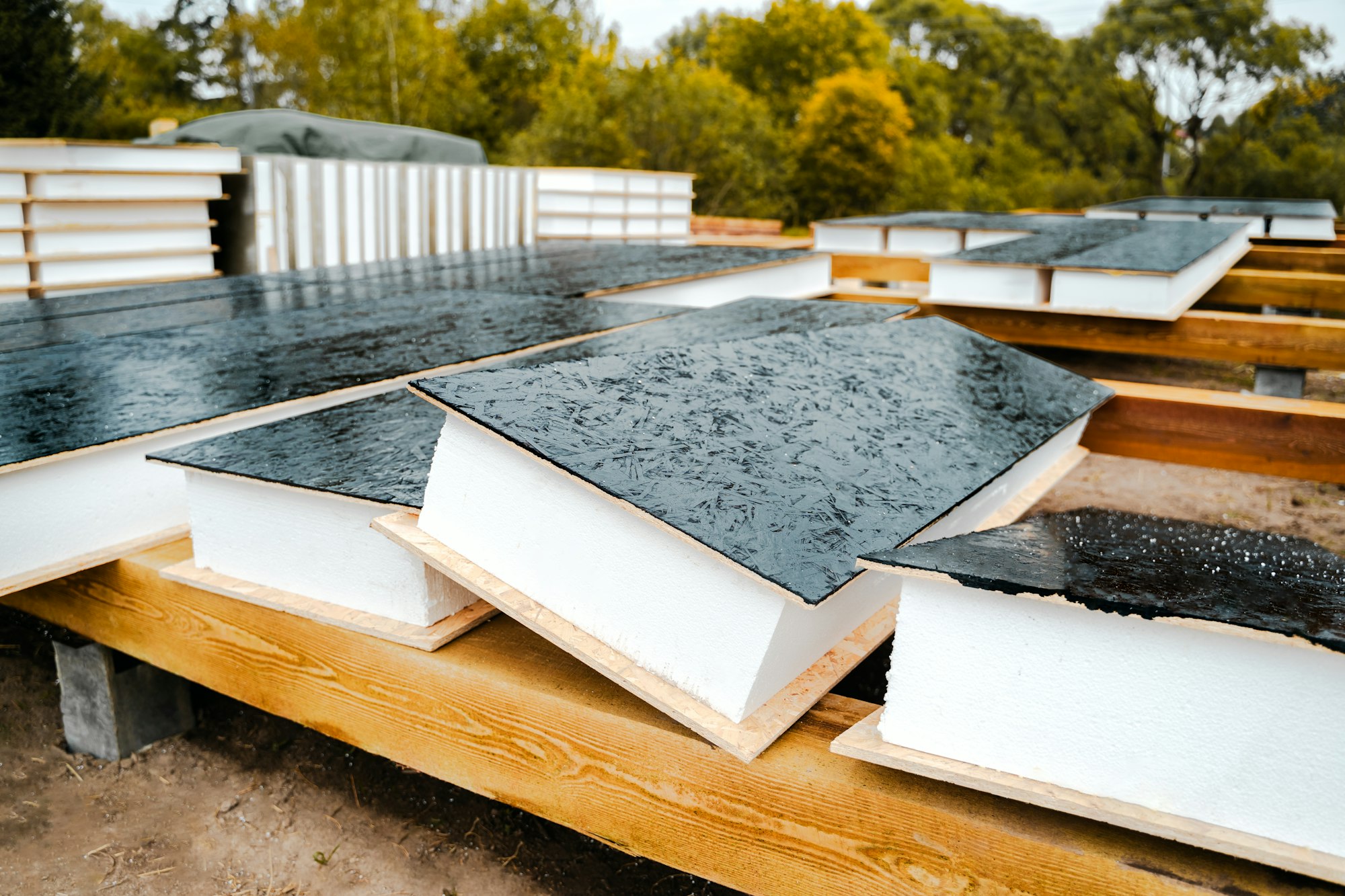 Building construction of wooden frame house made of SIP structural insulated panels. OSB oriented